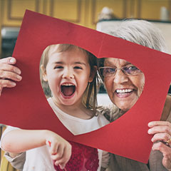Photo of a happy child and instructor. Link to Gifts That Protect Your Assets